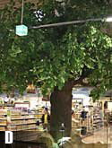 Kunstbaum-Stützenverkleidung in einem Supermarkt